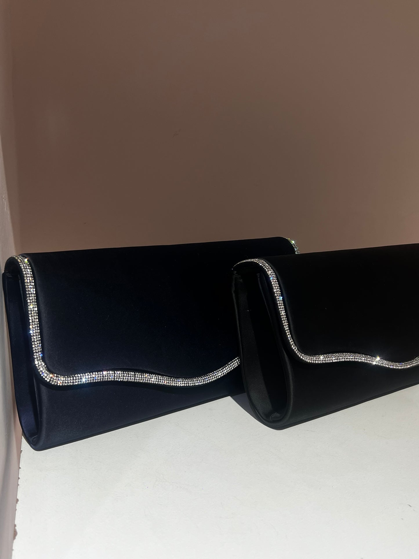 Borsa Emma effetto raso